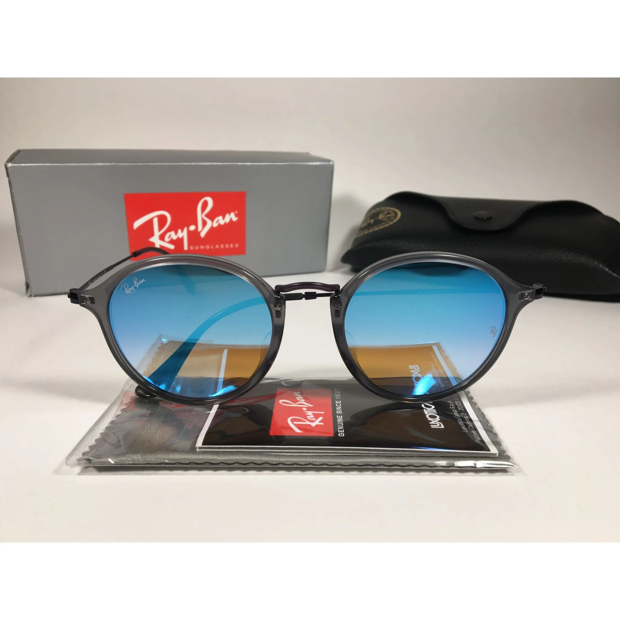 Ray-Ban Round Flat Sunglasses Purple And Gray Frame Blue Flash Lens RB2447NF 6255/4O